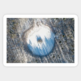 Winter landscape of round lake with island in the middle Sticker